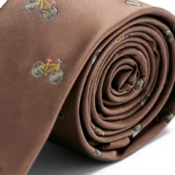 Brązowy wąski krawat w rowery